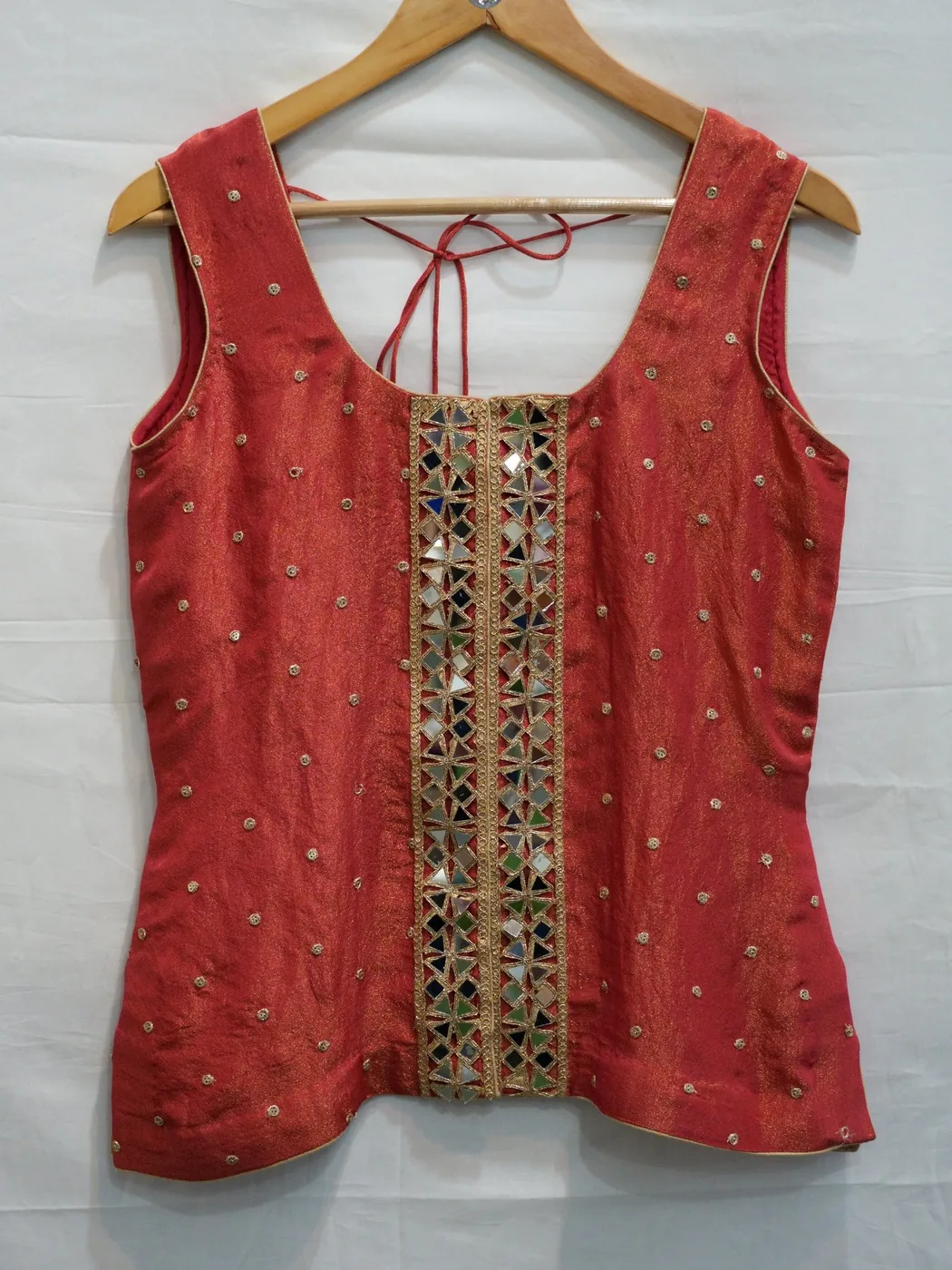 Original red embellished top product photo before AI model shoot